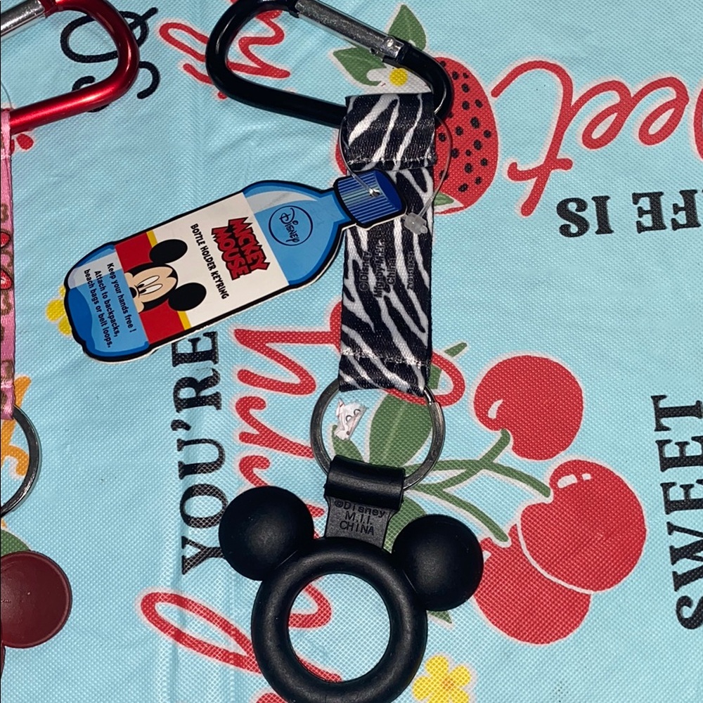 $15 each or $25 for both Disney Mickey Mouse water bottle key ring holder - Picture 3 of 5